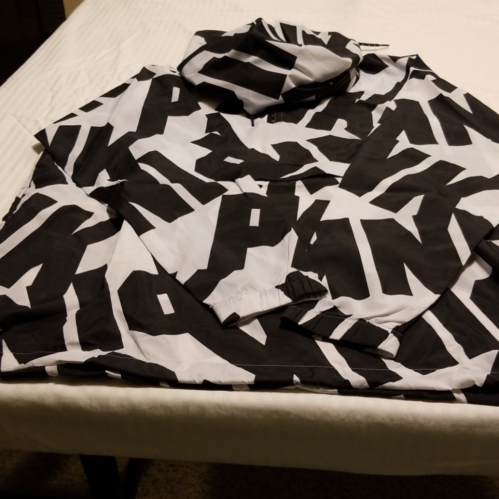 Black and white rain coat